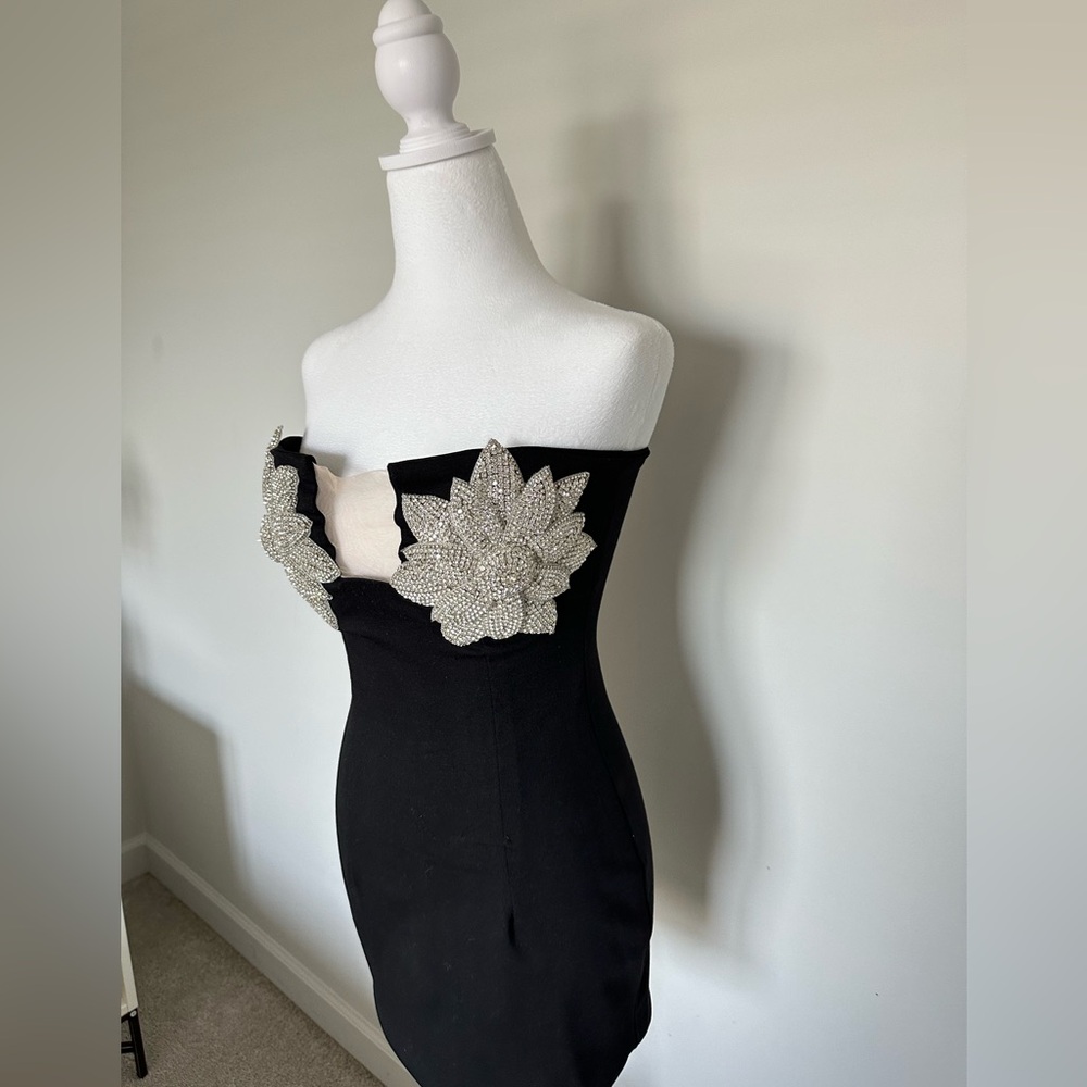 Women’s black mini dress with crystal detail